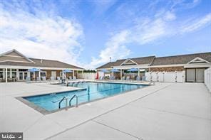 pool with a patio area