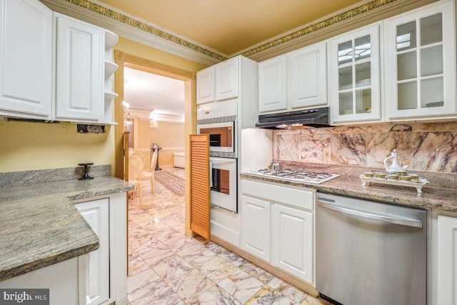 kitchen featuring tasteful backsplash, under cabinet range hood, white cabinetry, stainless steel dishwasher, and white gas stovetop