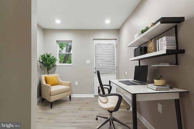 office featuring light wood-style floors, baseboards, and recessed lighting
