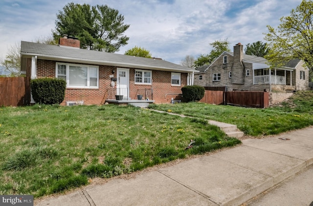 205 Polk Ave, Front Royal, VA 22630 - view of front facade featuring brick siding and a chimney