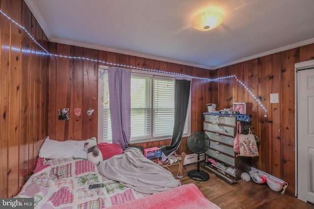 205 Polk Ave, Front Royal, VA 22630 - bedroom featuring wood walls, crown molding, and wood finished floors
