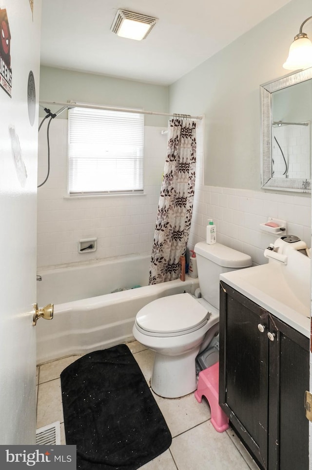 205 Polk Ave, Front Royal, VA 22630 - full bathroom with tile patterned flooring, tile walls, shower / tub combo with curtain, vanity, and toilet