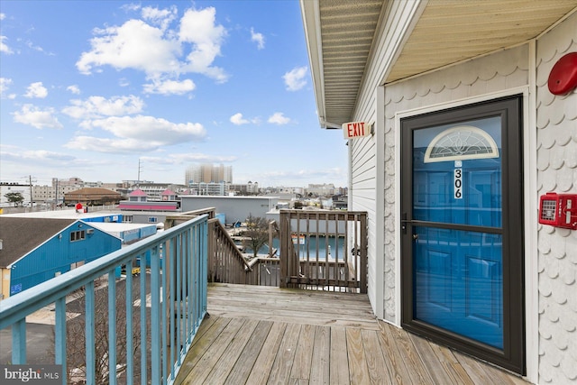 5401 Coastal Hwy Unit 306, Ocean City, MD 21842 - wooden deck with a water view and a view of city