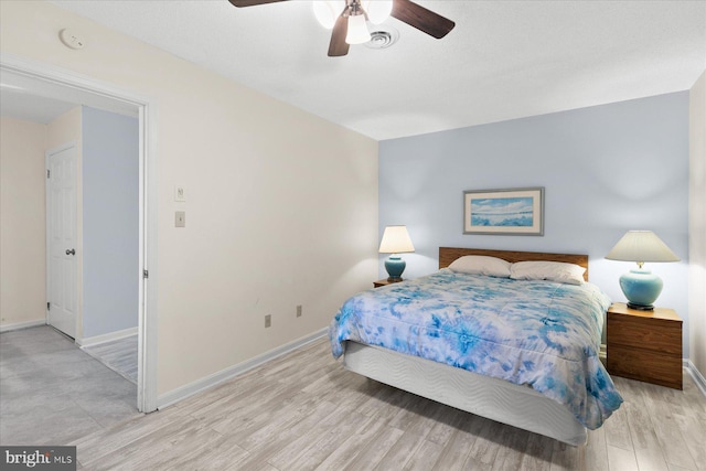 5401 Coastal Hwy Unit 306, Ocean City, MD 21842 - bedroom with light wood-style floors, baseboards, and ceiling fan