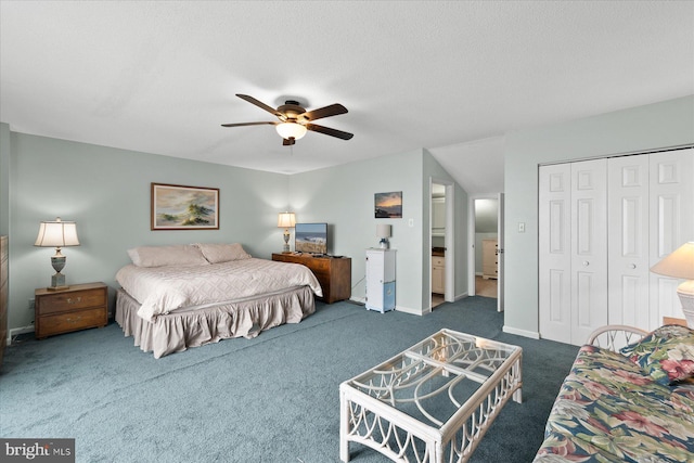 5401 Coastal Hwy Unit 306, Ocean City, MD 21842 - bedroom with baseboards, a closet, a textured ceiling, dark carpet, and ceiling fan