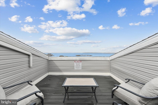 5401 Coastal Hwy Unit 306, Ocean City, MD 21842 - wooden terrace with a water view