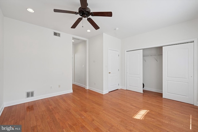 unfurnished bedroom featuring visible vents, recessed lighting, and light wood-style floors