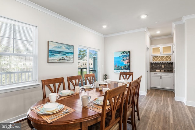 12435 Sea Oaks Ln Unit 3, Berlin, MD 21811 - dining room featuring ornamental molding, baseboards, recessed lighting, and light wood-style floors