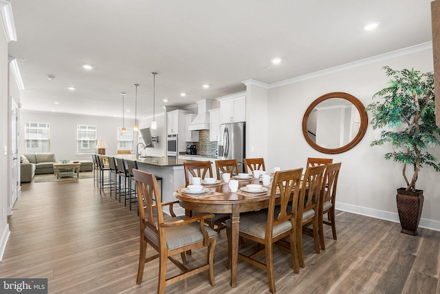 12435 Sea Oaks Ln Unit 3, Berlin, MD 21811 - dining space with ornamental molding, baseboards, dark wood finished floors, and recessed lighting