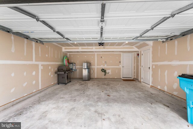 12435 Sea Oaks Ln Unit 3, Berlin, MD 21811 - garage featuring freestanding refrigerator