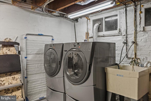 laundry room featuring independent washer and dryer