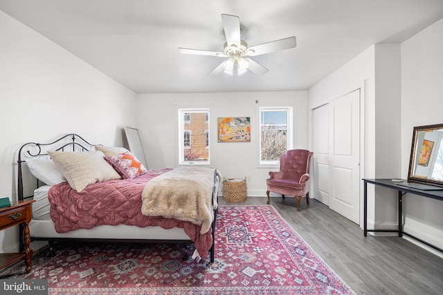 1529 E Berks St, Philadelphia, PA 19125 - bedroom with a closet, baseboards, a ceiling fan, and wood finished floors