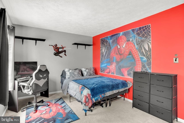 bedroom with carpet floors, a textured ceiling, and baseboards