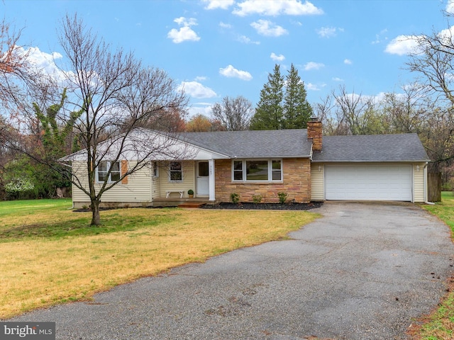 7147 Ohio Ave, Hanover, MD 21076 - single story home featuring stone siding, a front lawn, an attached garage, a chimney, and driveway