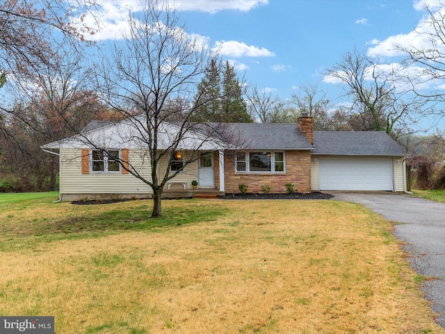 7147 Ohio Ave, Hanover, MD 21076 - ranch-style house featuring a chimney, stone siding, an attached garage, a front lawn, and aphalt driveway