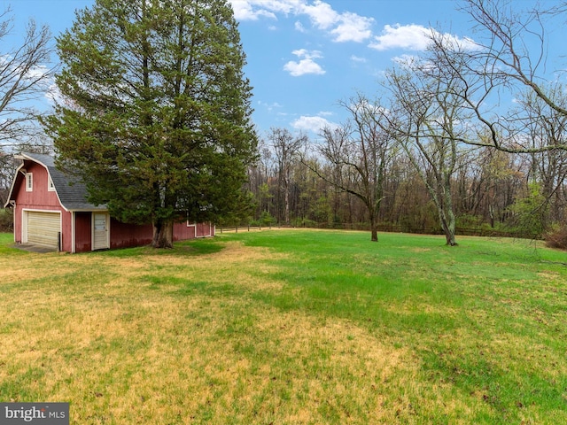 7147 Ohio Ave, Hanover, MD 21076 - view of yard featuring an outbuilding, a detached garage, and a barn