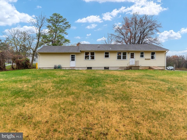 7147 Ohio Ave, Hanover, MD 21076 - rear view of property with a chimney and a lawn