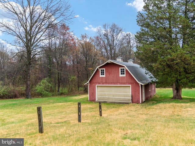 7147 Ohio Ave, Hanover, MD 21076 - view of barn featuring driveway and a lawn