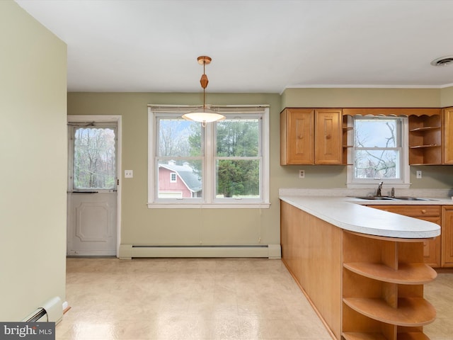 7147 Ohio Ave, Hanover, MD 21076 - kitchen featuring baseboard heating, light countertops, open shelves, visible vents, and a sink