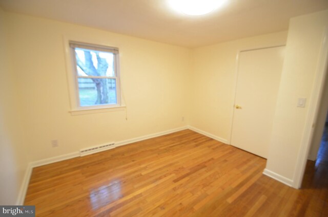 49 Wallace Rd, Princeton Junction, NJ 08550 - spare room with wood finished floors, baseboards, and visible vents