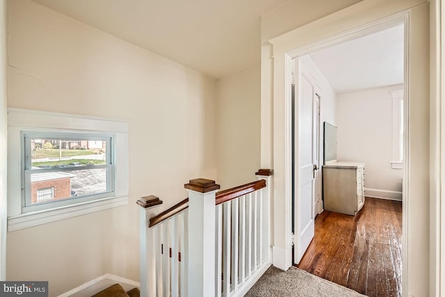 1233 Kahler Ave, Rosedale, MD 21237 - corridor featuring baseboards, an upstairs landing, and dark wood-style floors
