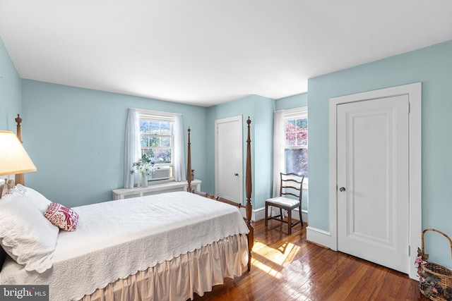 28 Ambler Rd, Cherry Hill, NJ 08002 - bedroom with baseboards, radiator heating unit, wood finished floors, and cooling unit