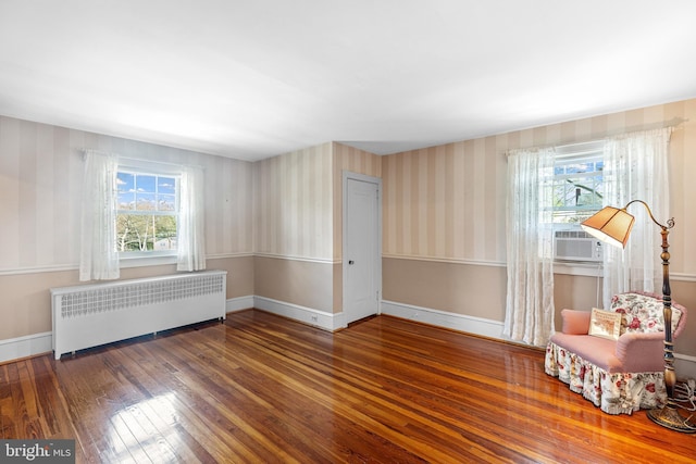 28 Ambler Rd, Cherry Hill, NJ 08002 - living area with radiator heating unit, a wealth of natural light, hardwood / wood-style flooring, and cooling unit