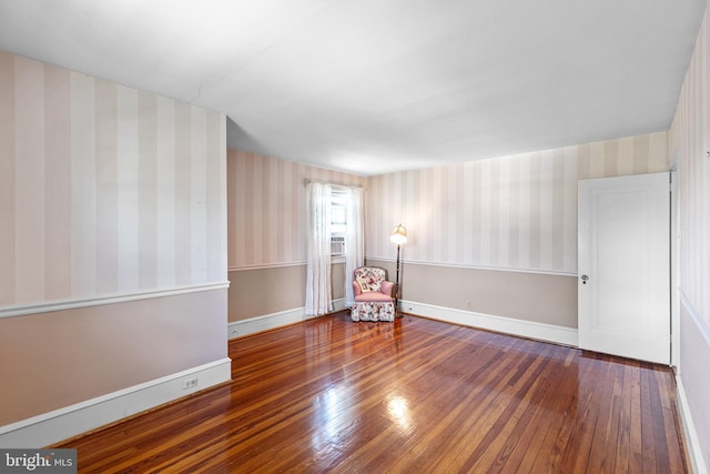 28 Ambler Rd, Cherry Hill, NJ 08002 - empty room featuring wood-type flooring, wallpapered walls, and baseboards