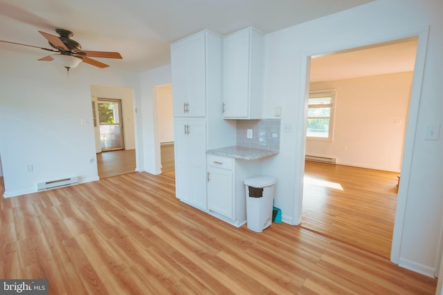 4513 Baker Valley Rd, Frederick, MD 21704 - kitchen with a baseboard radiator, light wood-type flooring, and plenty of natural light