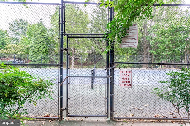 4024 Werthers Ct, Fairfax, VA 22030 - view of tennis court featuring a gate and fence