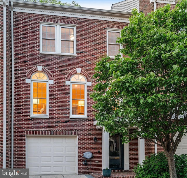 4024 Werthers Ct, Fairfax, VA 22030 - view of property with brick siding, driveway, and a garage