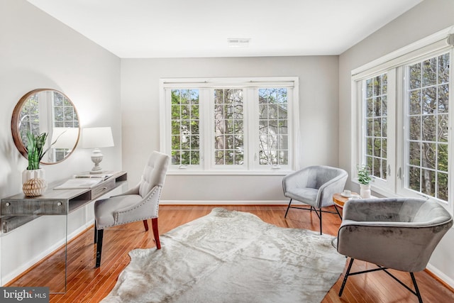 4024 Werthers Ct, Fairfax, VA 22030 - office space featuring wood finished floors, a healthy amount of sunlight, and baseboards