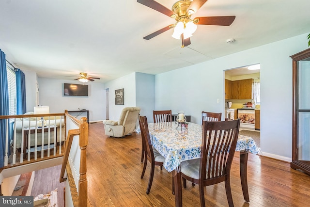 8549 Marybeth Way, Ellicott City, MD 21043 - dining space with ceiling fan, baseboards, and wood finished floors