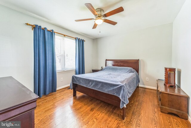 8549 Marybeth Way, Ellicott City, MD 21043 - bedroom with ceiling fan, baseboards, and wood finished floors