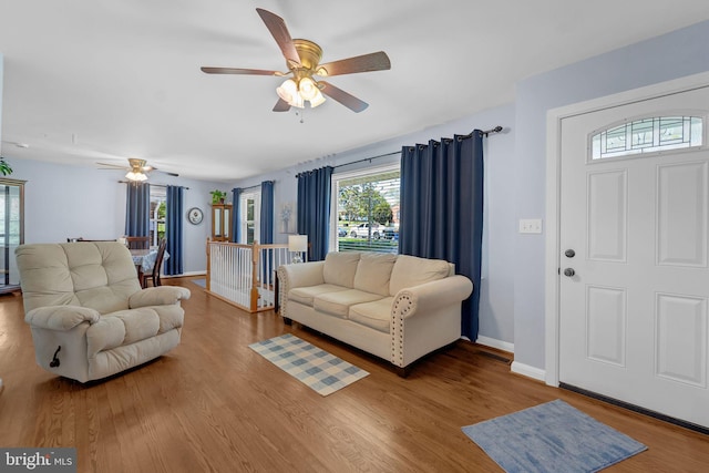 8549 Marybeth Way, Ellicott City, MD 21043 - living room with baseboards, ceiling fan, and wood finished floors