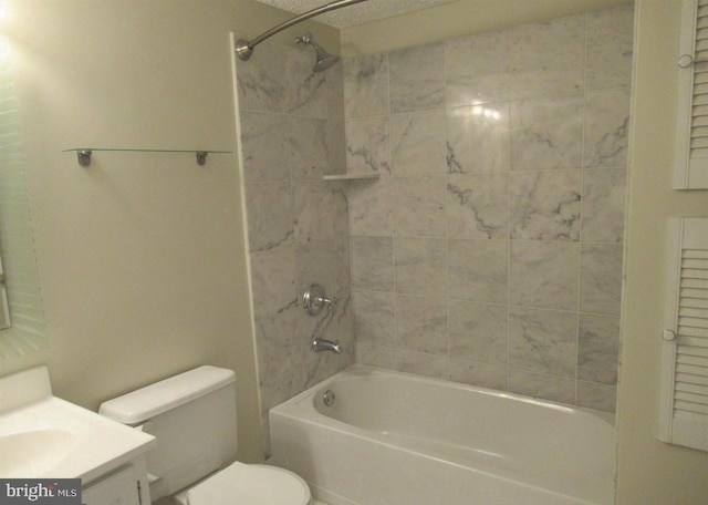 bathroom featuring toilet, vanity, and shower / tub combination