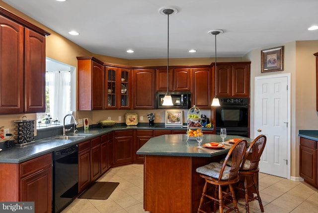 158 Mccormick Dr, Port Deposit, MD 21904 - kitchen featuring black appliances, a sink, dark countertops, light tile patterned floors, and a kitchen breakfast bar