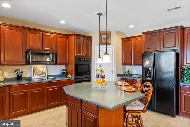 158 Mccormick Dr, Port Deposit, MD 21904 - kitchen featuring black appliances, light tile patterned flooring, a kitchen breakfast bar, pendant lighting, and recessed lighting