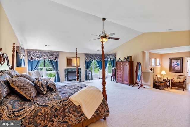 158 Mccormick Dr, Port Deposit, MD 21904 - carpeted bedroom featuring lofted ceiling, a high end fireplace, a ceiling fan, and access to exterior