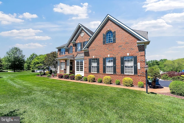 158 Mccormick Dr, Port Deposit, MD 21904 - view of front facade featuring a front yard and brick siding