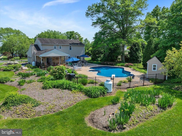 view of swimming pool with a patio area
