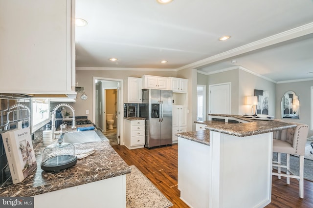 398 Grande Blvd, Rio Grande, NJ 08242 - kitchen featuring a sink, white cabinetry, stainless steel fridge, and dark wood-style floors
