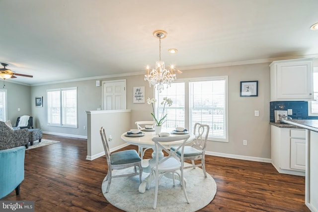 398 Grande Blvd, Rio Grande, NJ 08242 - dining area with dark wood-style floors, baseboards, crown molding, and ceiling fan with notable chandelier