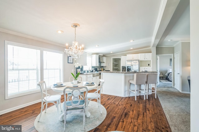 398 Grande Blvd, Rio Grande, NJ 08242 - dining area featuring baseboards, ornamental molding, lofted ceiling with beams, a chandelier, and dark wood-type flooring