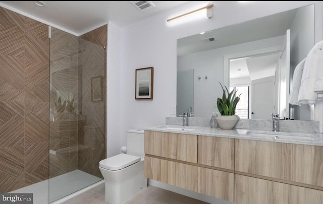 7700 Georgia Ave NW Unit 303, Washington, DC 20012 - bathroom with a sink, visible vents, and toilet
