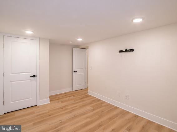 2001 S Norwood St, Philadelphia, PA 19145 - below grade area with recessed lighting, light wood-style flooring, and baseboards