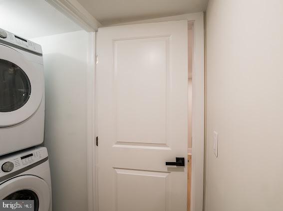2001 S Norwood St, Philadelphia, PA 19145 - clothes washing area with stacked washer / dryer and laundry area