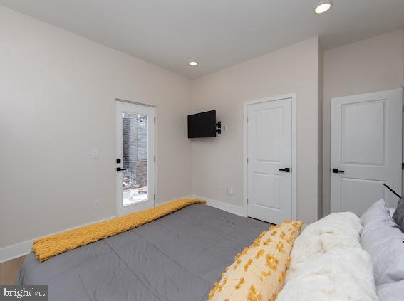 2001 S Norwood St, Philadelphia, PA 19145 - bedroom featuring baseboards and recessed lighting