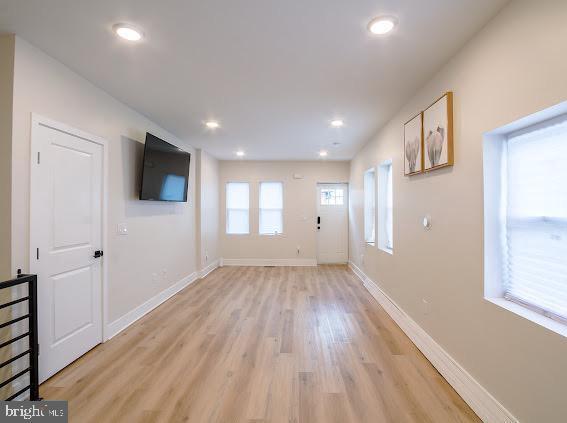 2001 S Norwood St, Philadelphia, PA 19145 - doorway to outside featuring light wood-style floors, baseboards, and recessed lighting
