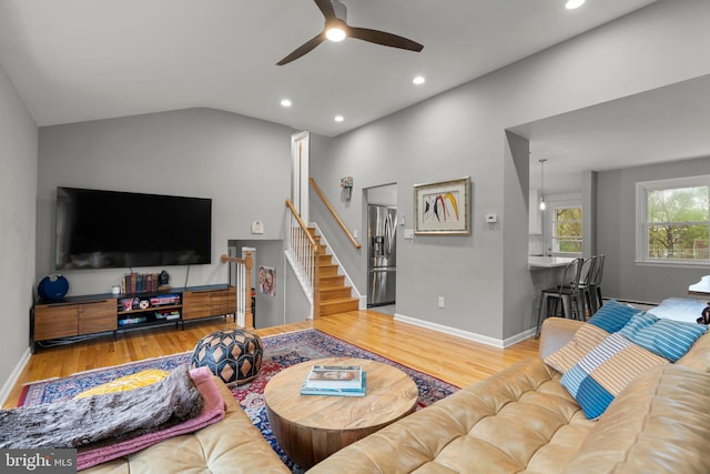 living room with recessed lighting, stairs, a ceiling fan, and wood finished floors